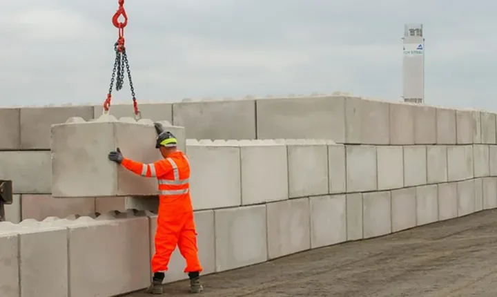 lifting the concrete blocks